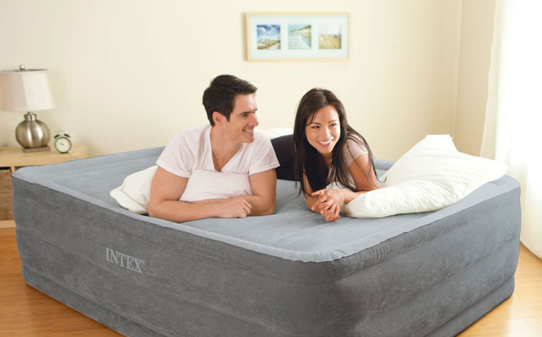 Couple relaxing on an air mattress