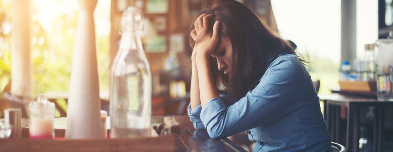 Young woman having a migraine