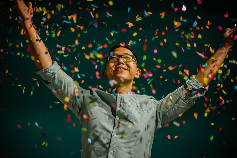 happy-young-man-with-confetti happy young man with confetti