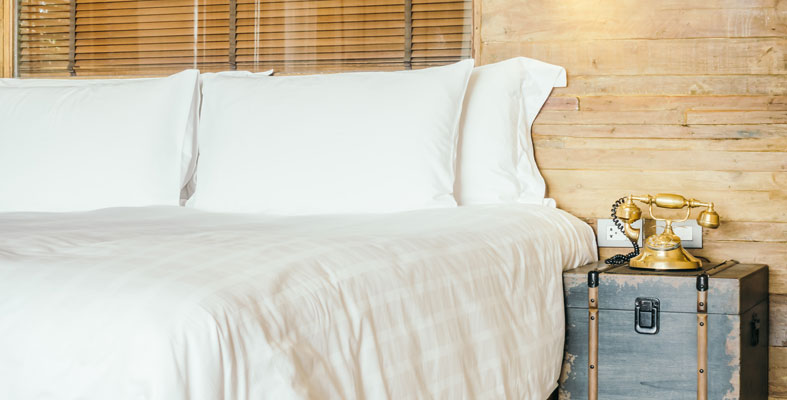 image of a white bed in bedroom
