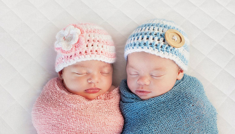 Find Out How Long Crib Mattresses Are Good For 3 two babys sleep on mattress