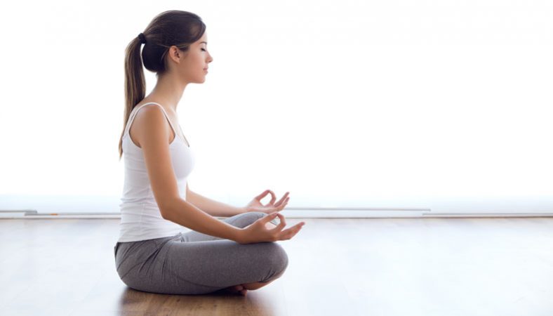 woman meditates