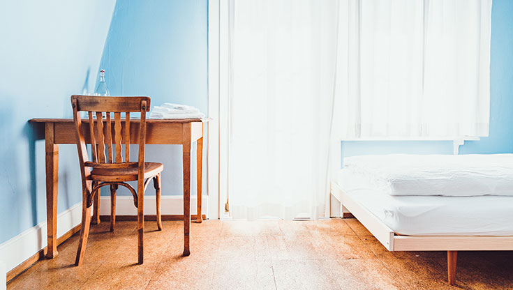 Modern Minimalist Bedroom Ideas – 7 Tips to Declutter Space 4 Blue bedroom with a desk and a chair from the wood