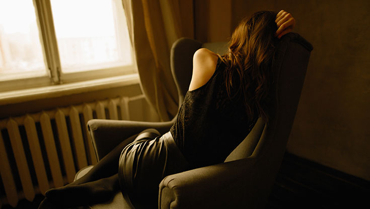 Woman is sitting in the chair