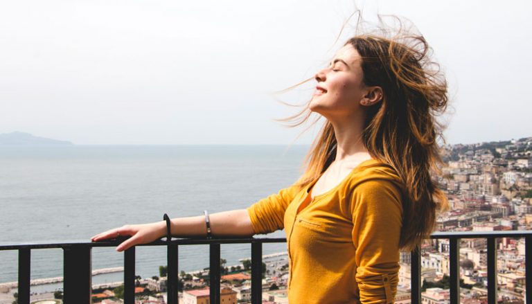 woman-enjoys the-wind woman enjoys the wind