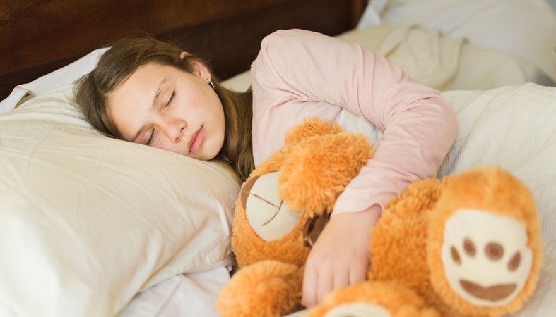 girl-sleeping-with-teddy-bear-on-bed girl sleeping with teddy bear on bed
