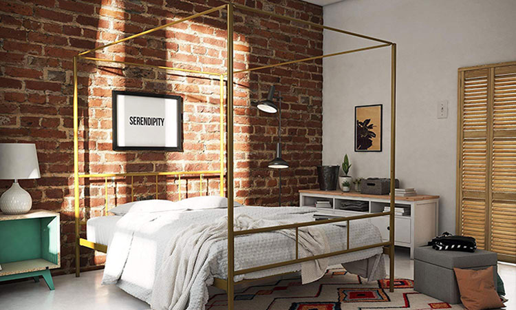 canopy bed with a golden frame and a brick wall behind it canopy bed with a golden frame and a brick wall behind it