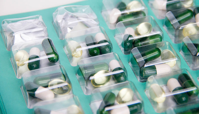 Packed white-green pills