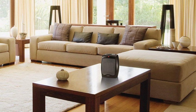 image of a beige living room with a heater in it image of a beige living room with a heater in it