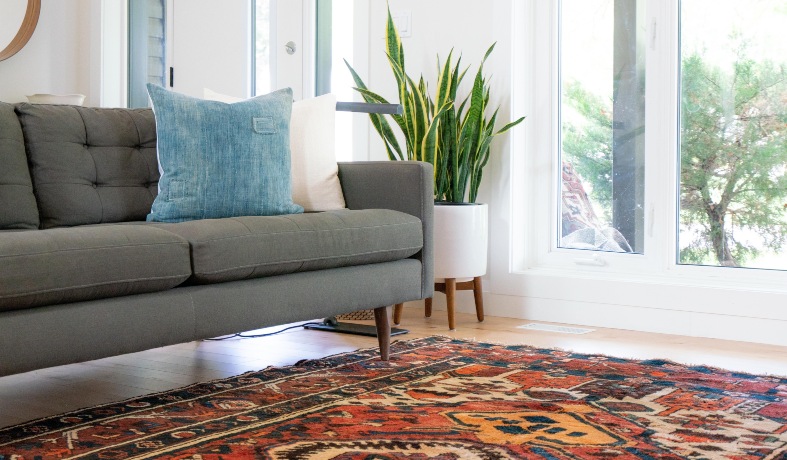 a bedroom with a nice colorful carpet a bedroom with a nice colorful carpet