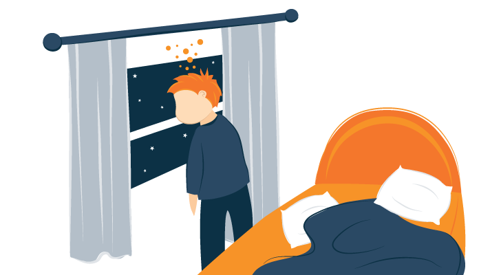 A man staring out his window looking tired A man staring out his window looking tired