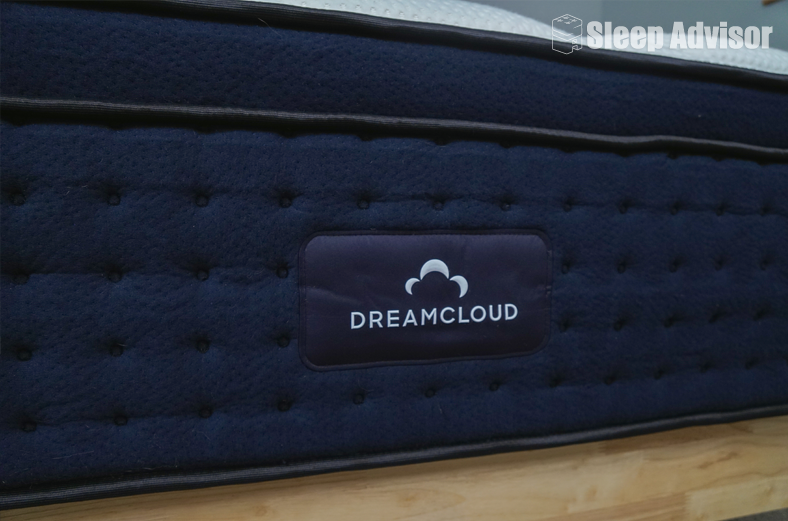 dreamcloud premier closeup image showing the logo on the front of the mattress dreamcloud premier closeup image showing the logo on the front of the mattress
