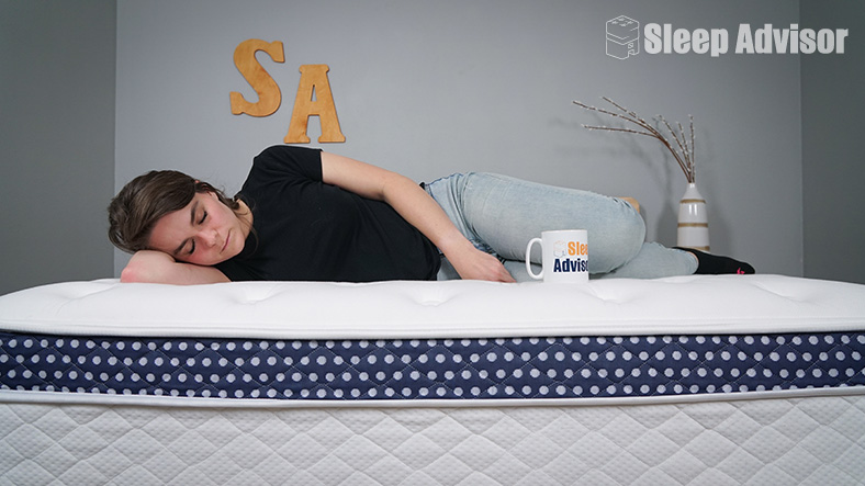 Image Showing Emma Side Sleeping on WinkBeds Plus Mattress