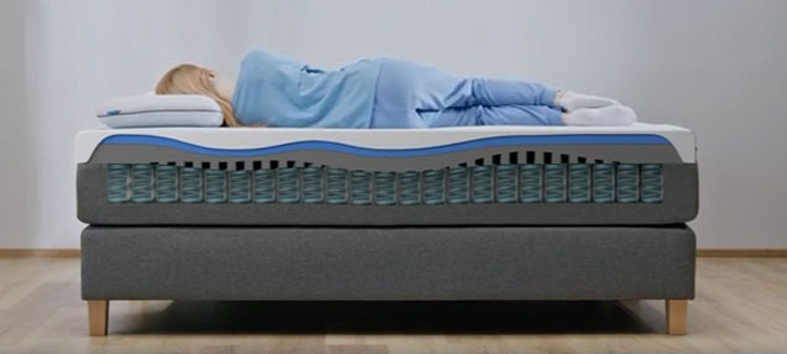 woman is sleeping on Emma CliMax mattress