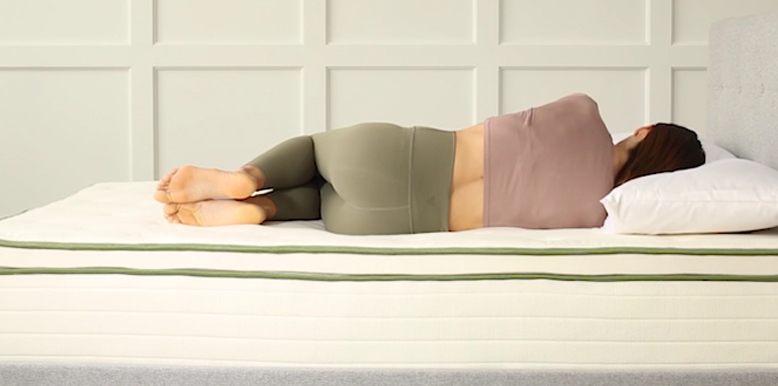 a-woman-is-lying-on-silk-and-snow a woman is lying on silk and snow