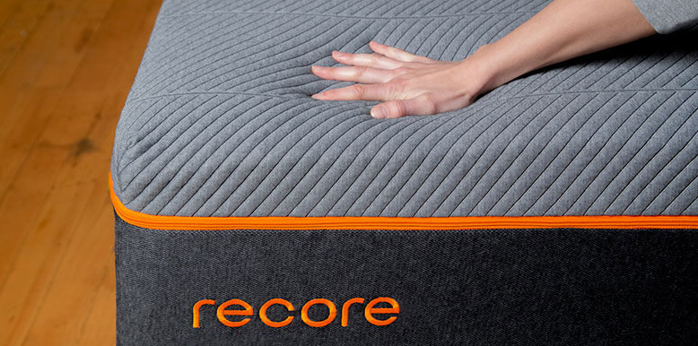 the hand is squishing Recore mattress