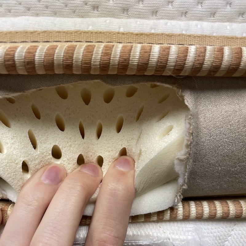 Julia Forbes, testing a latex mattress