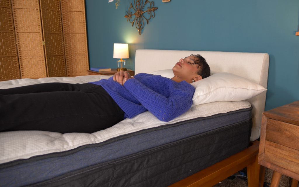 Our lead product tester Loren testing the Helix Midnight Luxe in various sleeping positions