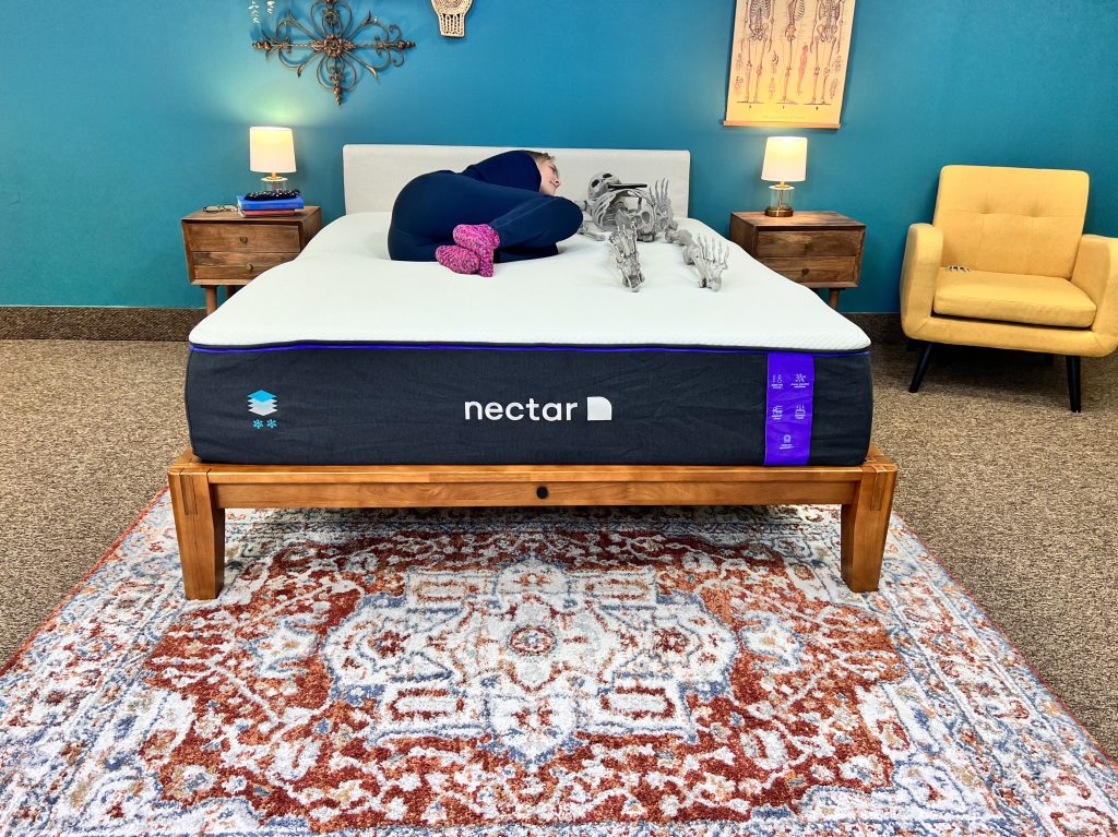Our testers testing motion isolation technology of the Nectar Premier