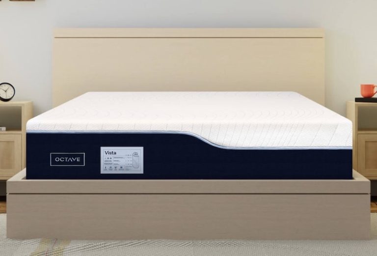 A photo of the Octave Vista mattress on a beige bed frame